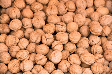 Whole walnuts background texture