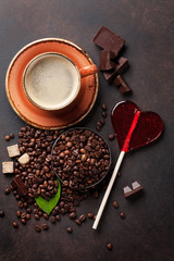 Obraz na płótnie Canvas Coffee cup, beans, chocolate