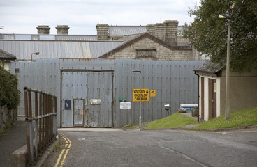 Metal security fencing surrounds HMP Dartmoor in Princetown Devon England UK