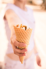 Girl offers ice cream