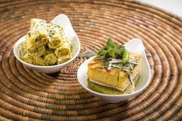 Indian Food Dhokla with Chees and Khandvi