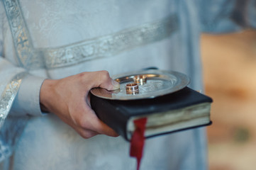 little girl or boy Carrying Wedding Ring On Cushion