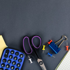 Back to School, supplies, notebook on the grey background. square