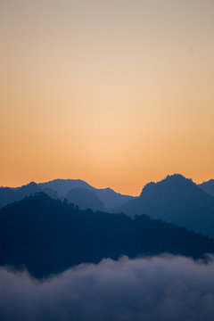 Silhouette layers of mountains in the morning.