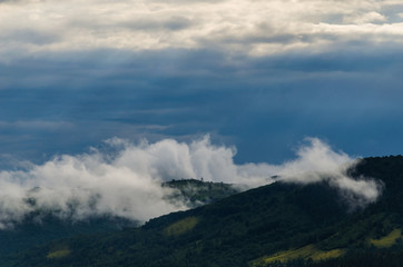 Fototapeta na wymiar Ukrainian carpathian mountaine landscape with fog