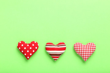 Love hearts on the green background