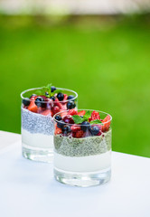 Chia seed pudding breakfast with summer berries. Healthy food concept.