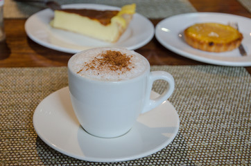 Single hot coffee on the wooden table