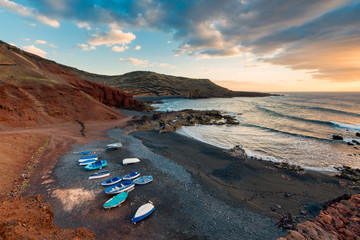 Volcanic Beach in El Golfo, Lanzarote, Canary Islands, Spain at sunset