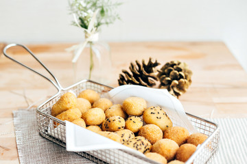 Freshy fried spanish croquetas or crockets filled with chicken, jamon or cod fish, typical and traditional delicious savoury tasty tapas