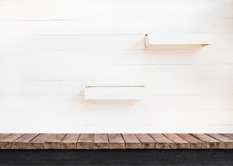 Clear Table on white wooden 2 shelves wall background