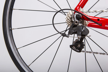 Mechanism. Bicycle Concept. Part of the rear wheel, gear, chain. On a white background.