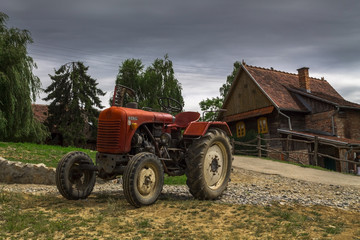 Rustic tractor and house