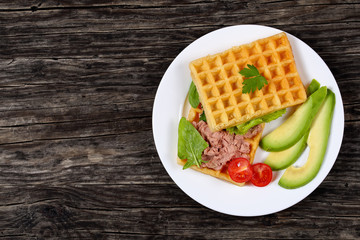 salted waffles sandwich with avocado, pate