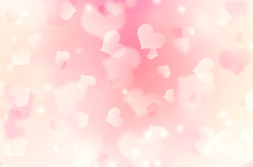Heart shaped bokeh pink blurred background.