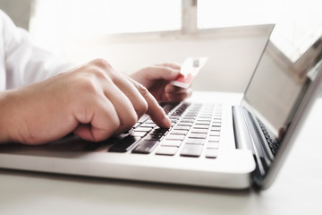 Business online shopping concept. People shopping and pay by credit card.