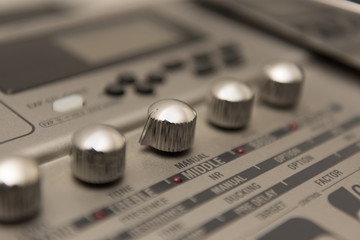 Details of Guitar Music Recording Equipment with Chrome Knobs