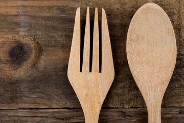 Wooden utensil kitchen on wooden table background