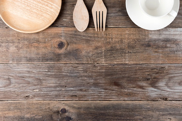 Wooden utensil kitchen on wooden table background