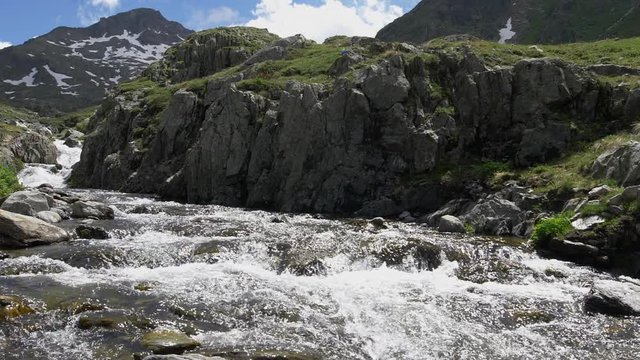Mountain Stream in Switzerland Alps in Slow Motion. Great St Bernard Pass