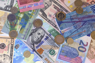 Abstract dollar euro swiss franc and coins background.