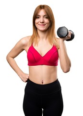 Happy beautiful sport woman with dumbbells