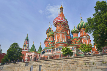 Fototapeta na wymiar View on Moscow Red Square, Kremlin towers, stars and Clock Kuranti, Saint Basil's Cathedral church. Moscow Red Square Saint Basil's Cathedral church. Moscow vacation tours famous sightseeing points