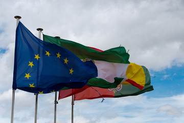 flags of eu, andalusia, spain, granada