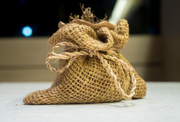 Clay pots in Homemade small sack