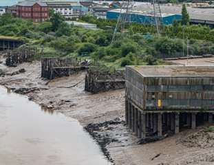 Derelict building next to river