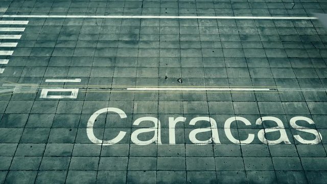 Aerial view of big airplane arriving to Caracas airport. Travel to Venezuela conceptual intro animation