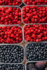 pattern of blueberries and raspberries on the counter trade.