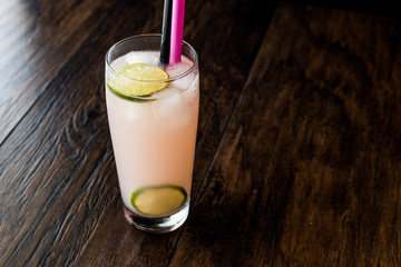 Greyhound Cocktail with lime (made with grapefruit).