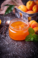 Apricot jam in glass jar