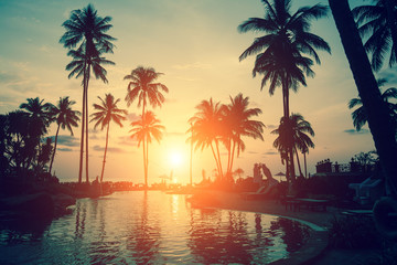 Naklejka na ściany i meble Amazing sunset at a beach resort in the tropics.