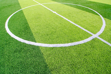 Obraz premium The white Line marking on the artificial green grass soccer field