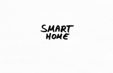 Smart Home in black handwriting, felt pen on white paper