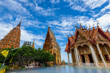 Wat Tham Sua in Kanchanaburi, Thailand is a beautiful day, so it is very popular with tourists and...