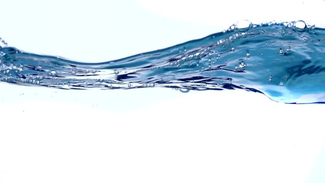 Waving and splashing fresh water closeup. Underwater. 4K video 3840X2160. Slow motion 240 fps