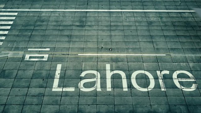 Aerial view of big airplane arriving to Lahore airport. Travel to Pakistan conceptual intro animation
