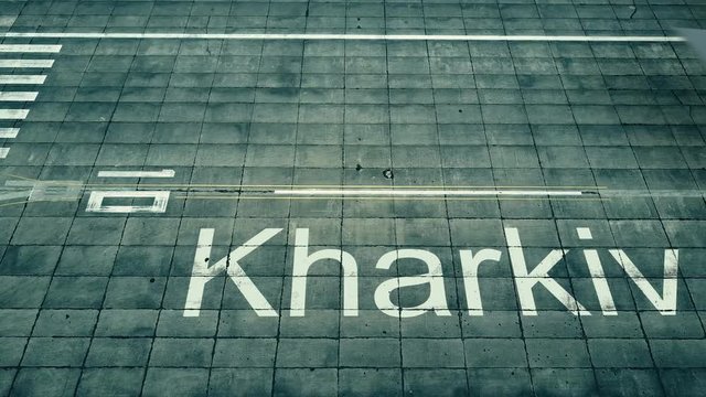 Aerial view of big airplane arriving to Kharkiv airport. Travel to Ukraine conceptual intro animation