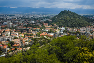 Fototapeta na wymiar Amazing Panoramic view of city of Plovdiv from Bunardzhik tepe hill (hill of libertadors), Bulgaria