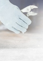 Hand with plier on building site with transition effect