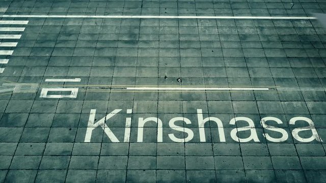 Aerial view of big airplane arriving to Kinshasa airport. Travel to Democratic Republic of the Congo conceptual intro animation