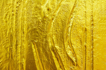 golden texture background.Striped golden texture.carving golden texture