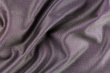 Layered purple fabric upper with a black translucent layer of texture to the design