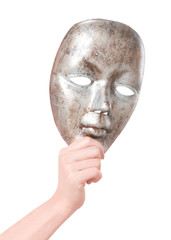 Hand holding face mask