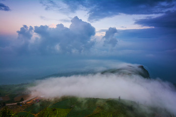 Background blur white mist floating on the mountain.Fog filled the sky and white clouds, beautiful.Photos from above.