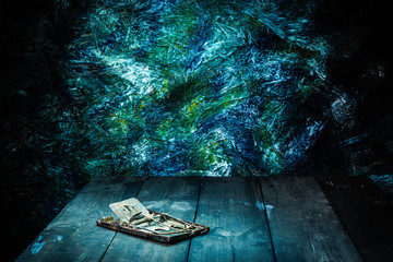 Still life stlye of old rattrap on wooden floor