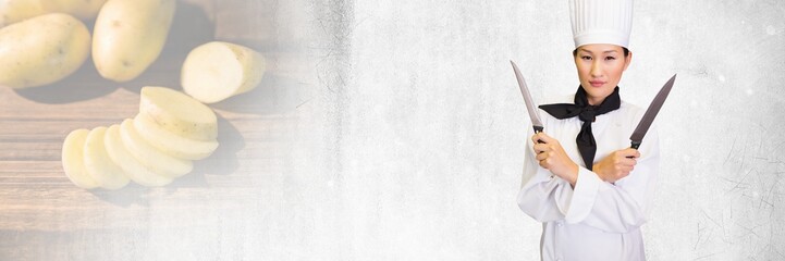 Chef holding knife blades with chopped vegetables transition